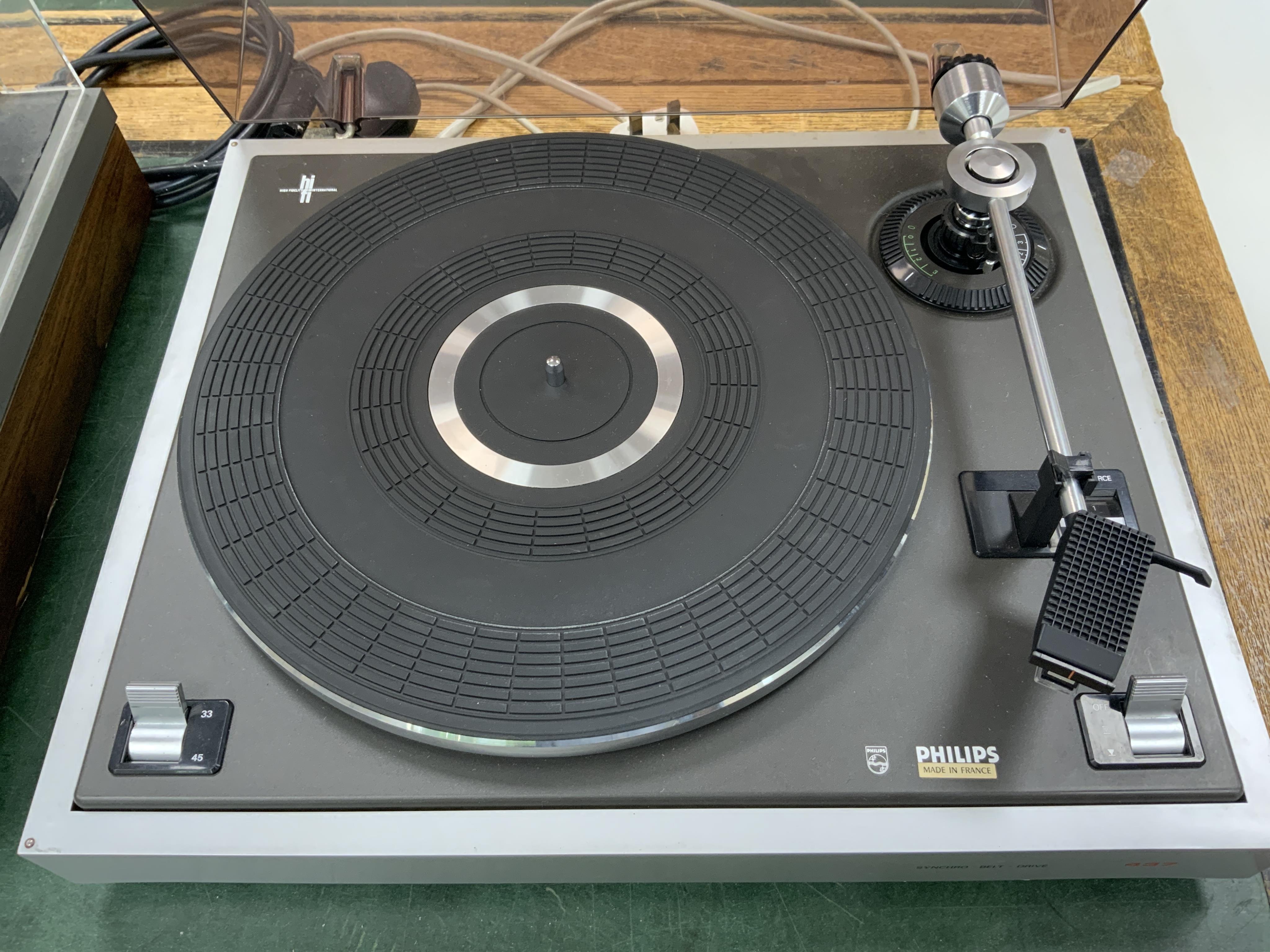 Two record players; a Philips 437 turntable together with a Pioneer PL-112D turntable, both with leads. Condition - fair to good